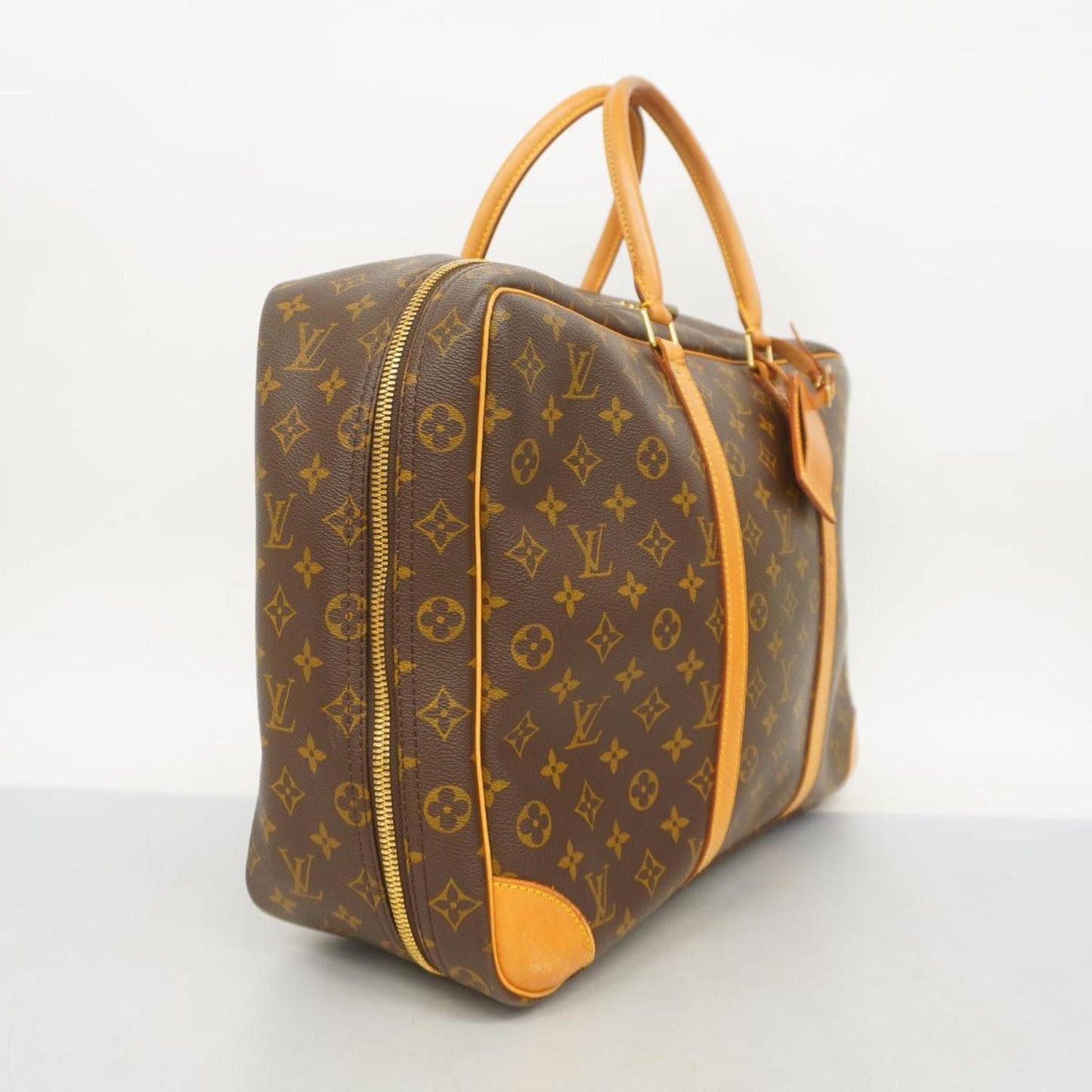 Louis Vuitton Sirius Canvas Travel Bag ()
