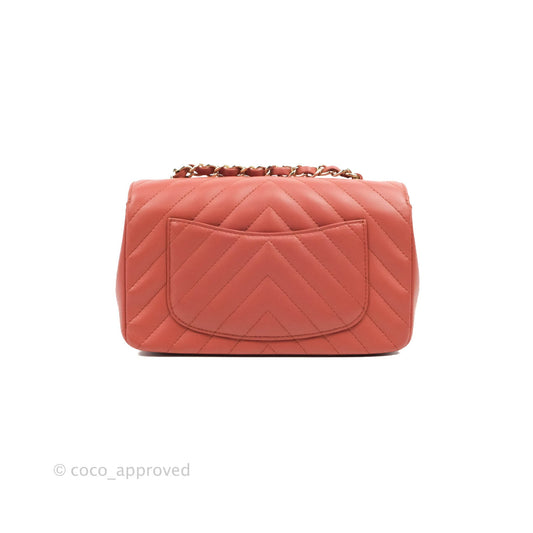 Chanel Chevron Mini Rectangular Flap Brick Red Lambskin Aged Gold Hardware