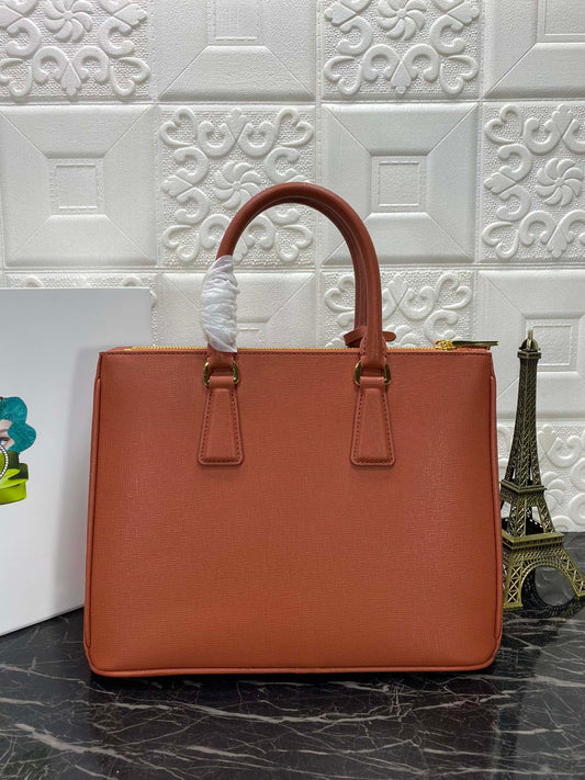Luxury PradaGALLERIA 32 BAG IN BRONZE ORANGE SAFFIANO LEATHER