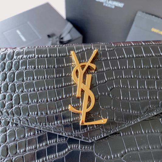 Luxury Saint Laurent UPTOWN POUCH 27 IN BLACK CROCODILE-EMBOSSED SHINY CALFSKIN GOLD LOGO
