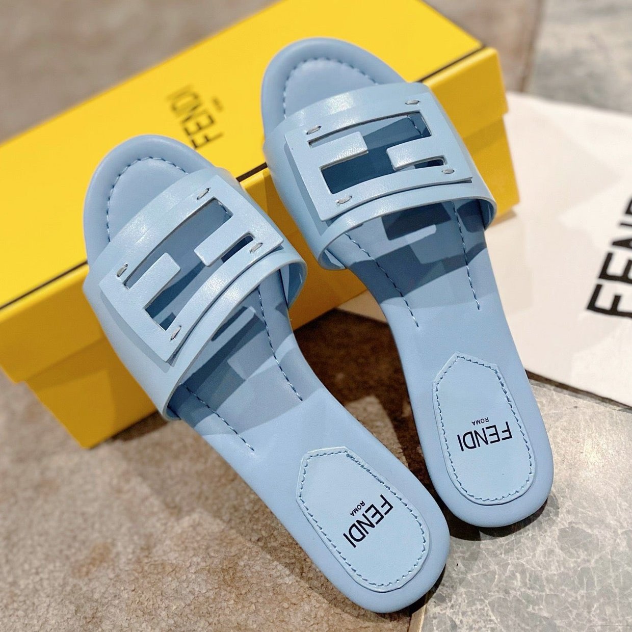 Luxury FendiLuxury FendiBAGUETTE SLIDES IN BABY BLUE LAMBSKIN