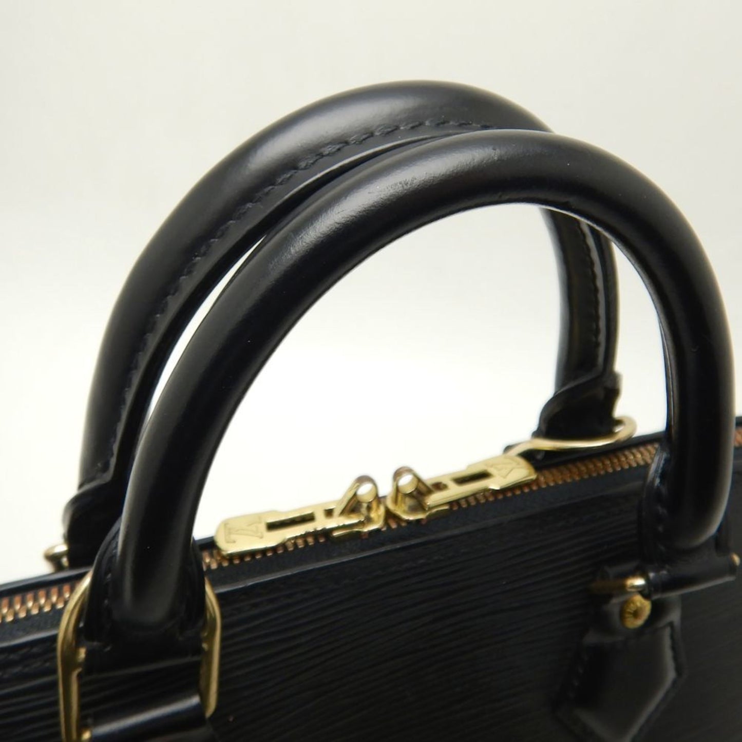 Louis Vuitton Alma Leather Handbag ()