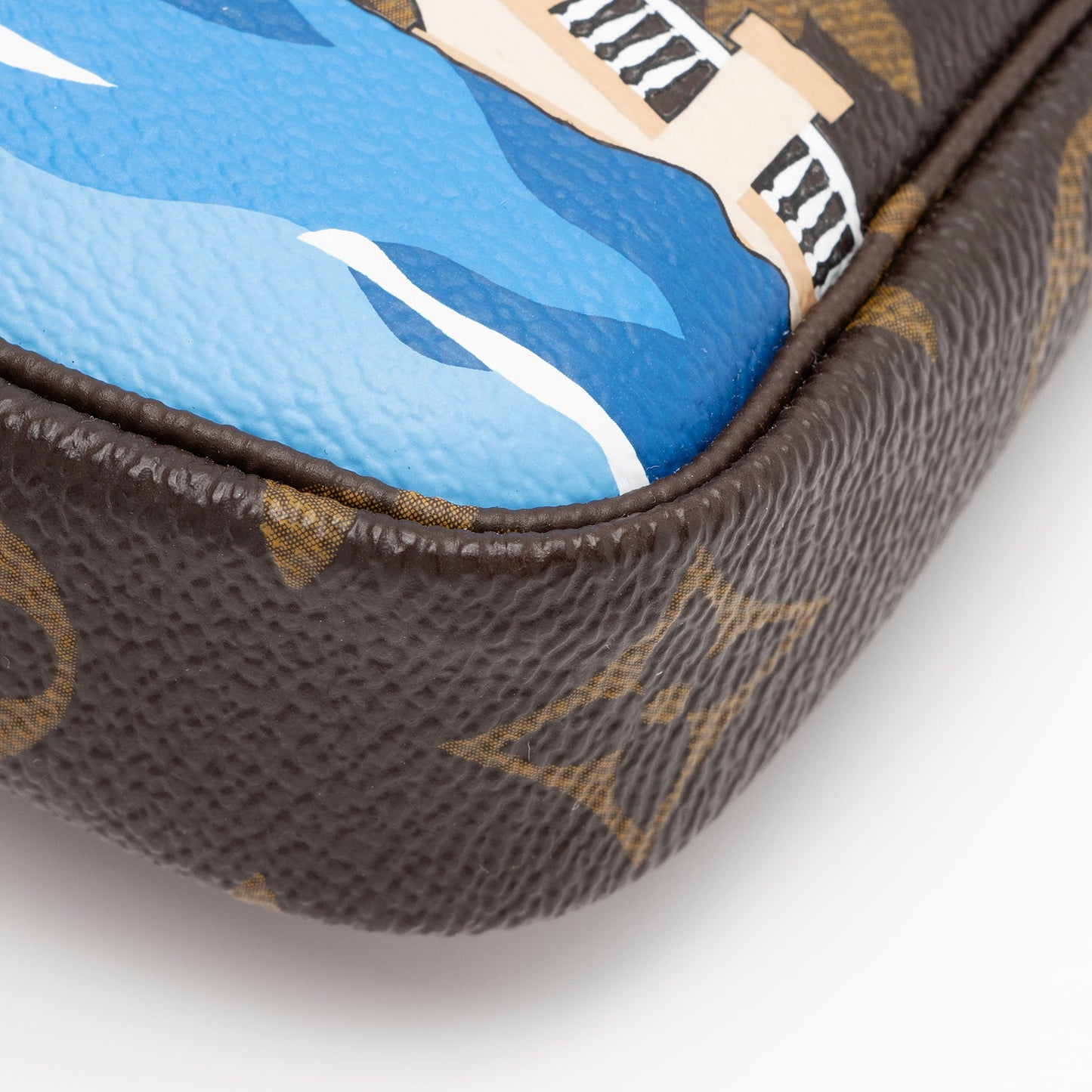Louis Vuitton Limited Edition Monogram Canvas Vivienne Mini Pochette Accessoires (SHF-fOwdXI)