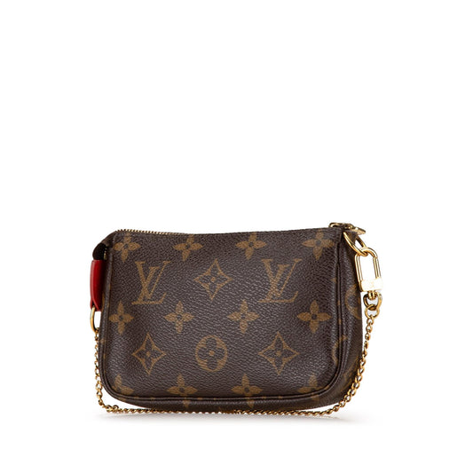 Louis Vuitton Mini Monogram Vivienne Christmas Pochette Accessoires (SHG-Vl6wam)
