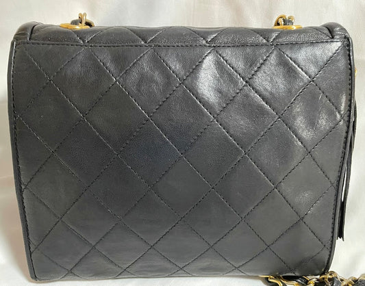 Luxury Chanel Vintage black fringe camera bag with double flaps