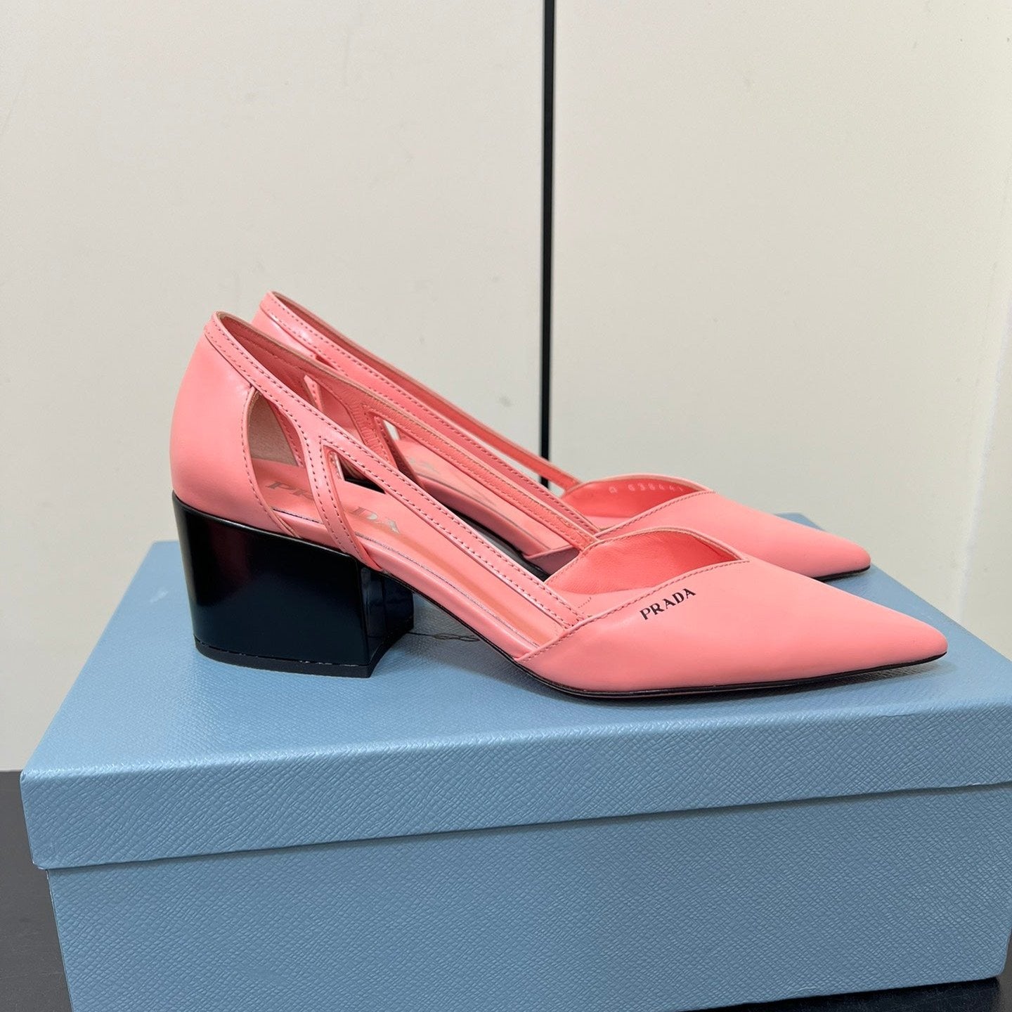 Luxury PradaBRUSHED CUT-OUT PUMPS IN SALMON PINK CALFSKIN