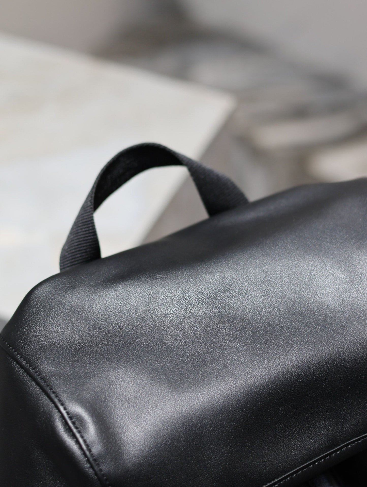 Luxury Saint Laurent BACKPACK 45 IN BLACK CALFSKIN WITH EMBOSSED LOGO