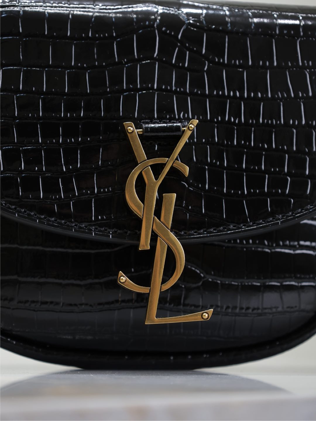 Luxury Saint Laurent KAIA SMALL CROCODILE PATTERN BAG 18 IN BLACK GLOSSY CALFSKIN COPPER HARDWARE