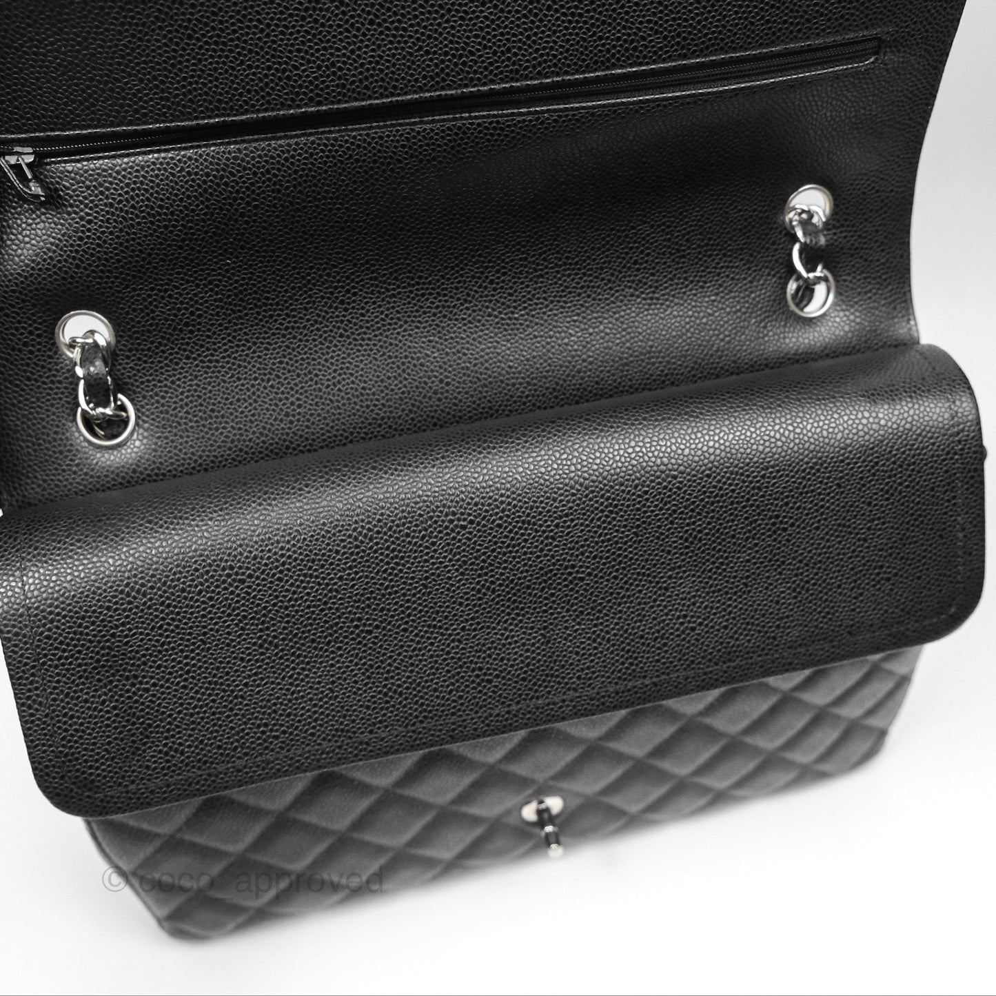 Chanel Quilted Maxi Double Flap Black Caviar Silver Hardware
