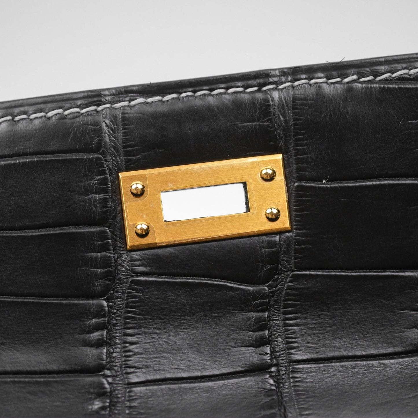 Hermès Retourne Kelly 25 Alligator Perso Noir 89 / Gris Mouette 4Z Brushed Gold Hardware