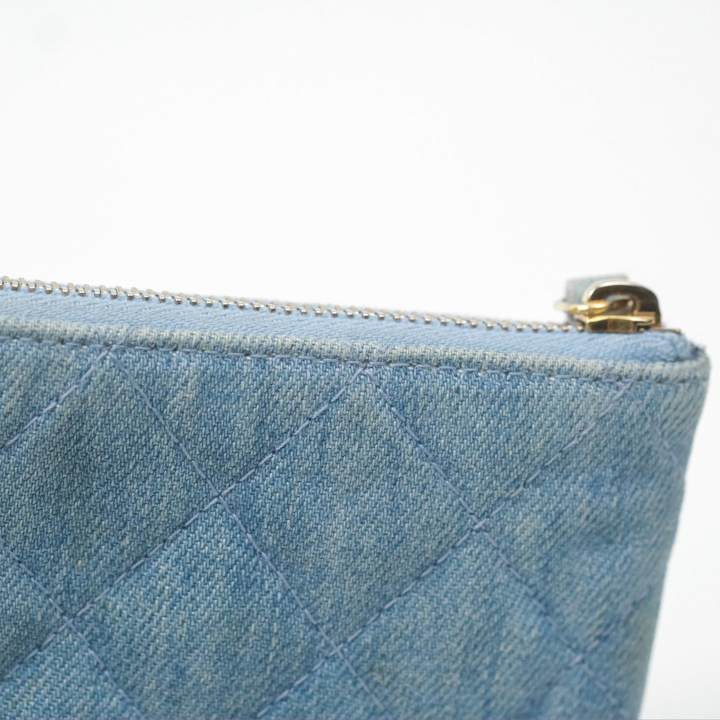Chanel Mini Reissue O Case Quilted Light Blue Denim Aged Gold Hardware