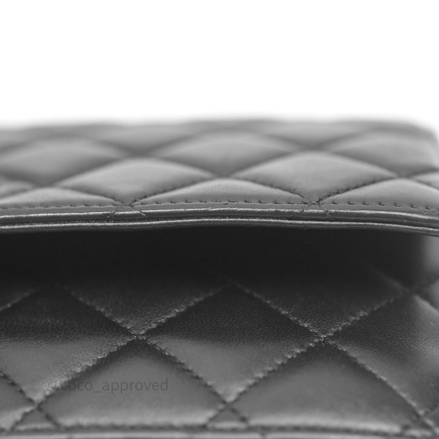 Chanel Quilted WOC Black Lambskin Silver Hardware