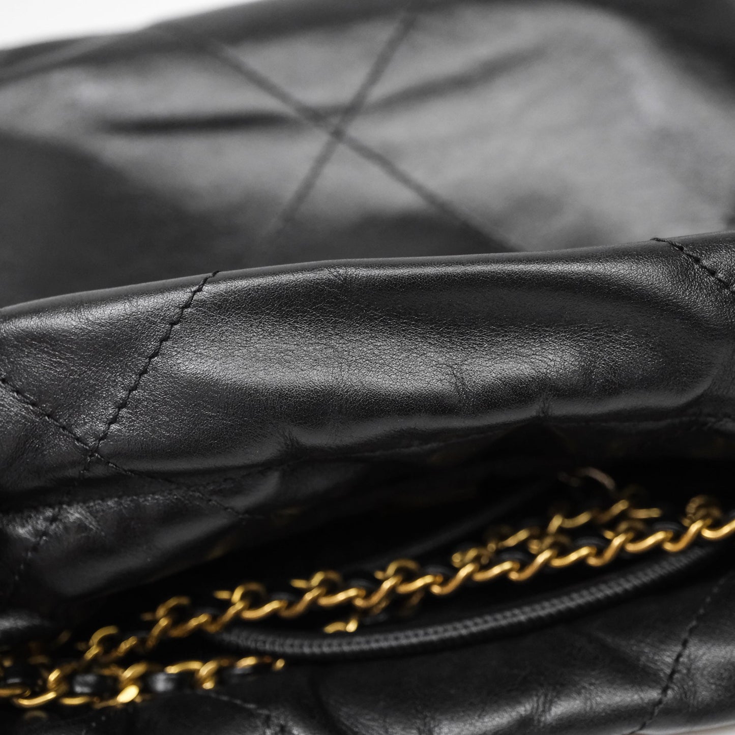 Chanel 22 Mini Bag Black Crumpled Calfskin White Lacquered Metal Logo