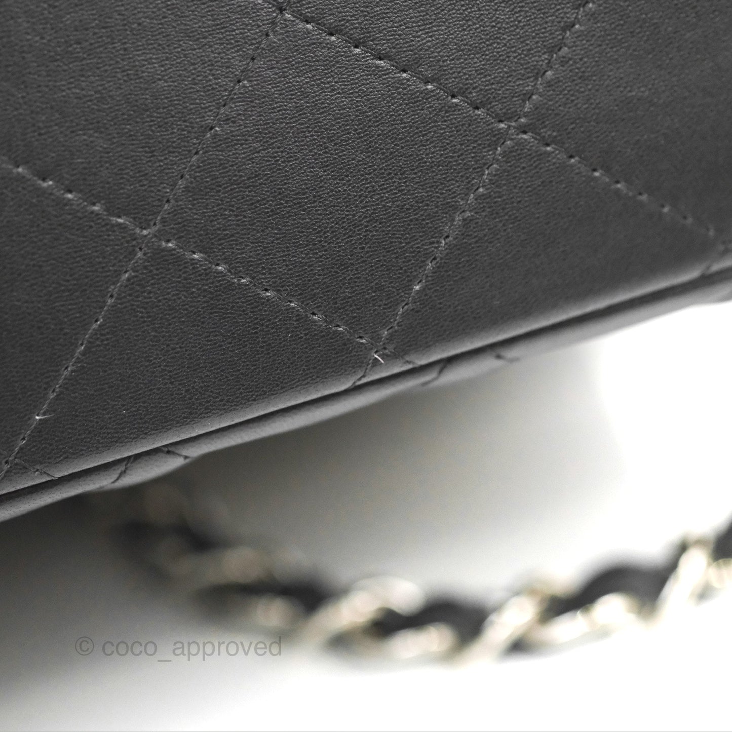 Chanel Quilted Maxi Double Flap Black Lambskin Silver Hardware