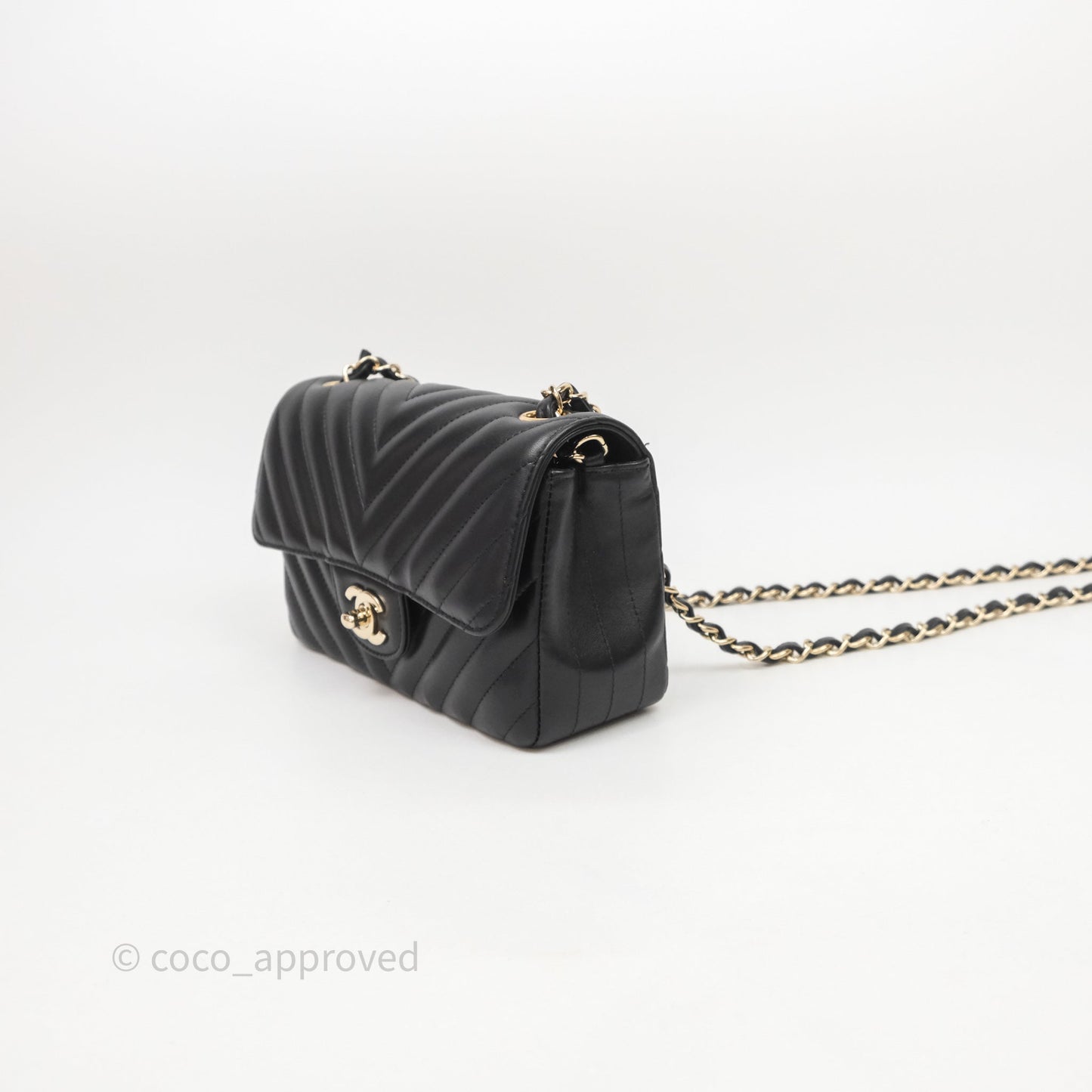 Chanel Quilted Mini Rectangular Chevron Black Lambskin Gold Hardware
