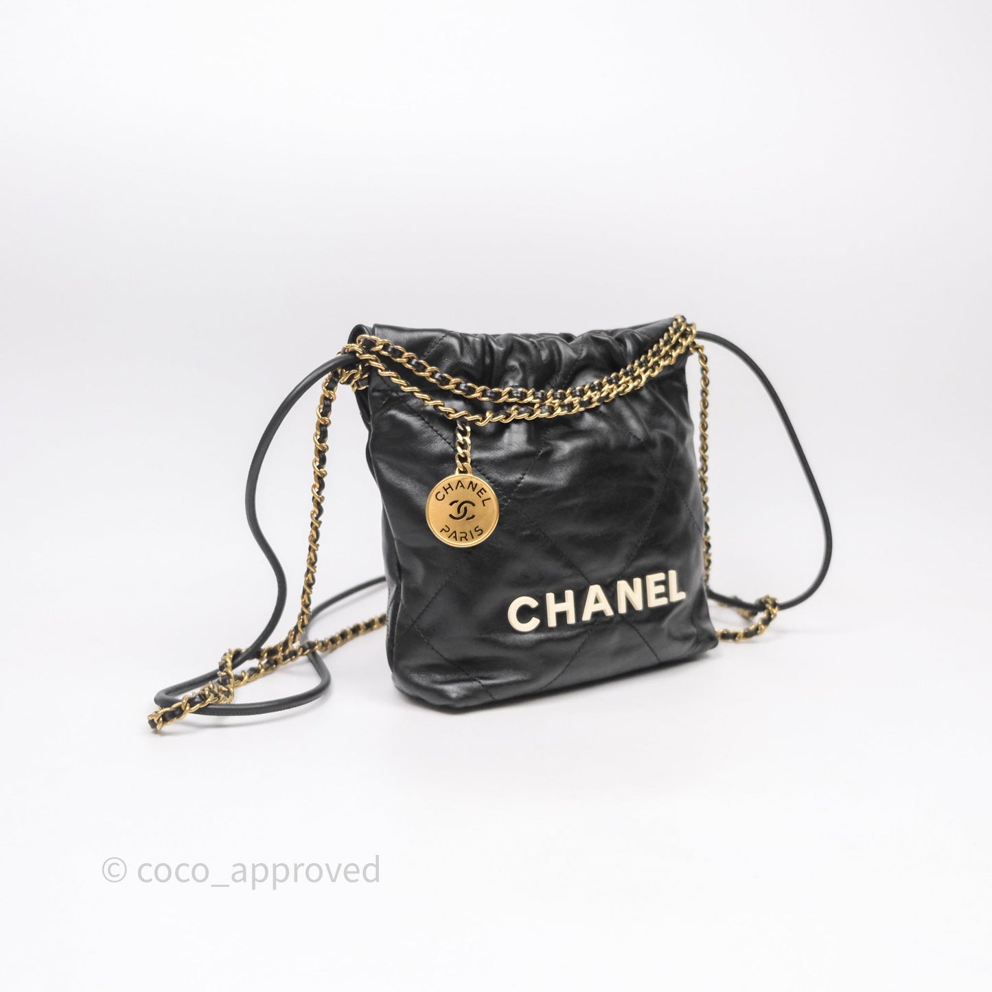 Chanel 22 Mini Bag Black Crumpled Calfskin White Lacquered Metal Logo