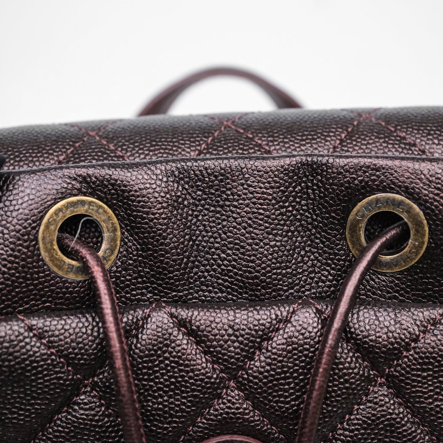 Chanel Quilted Filigree Backpack Iridescent Burgundy Caviar Aged Gold Hardware