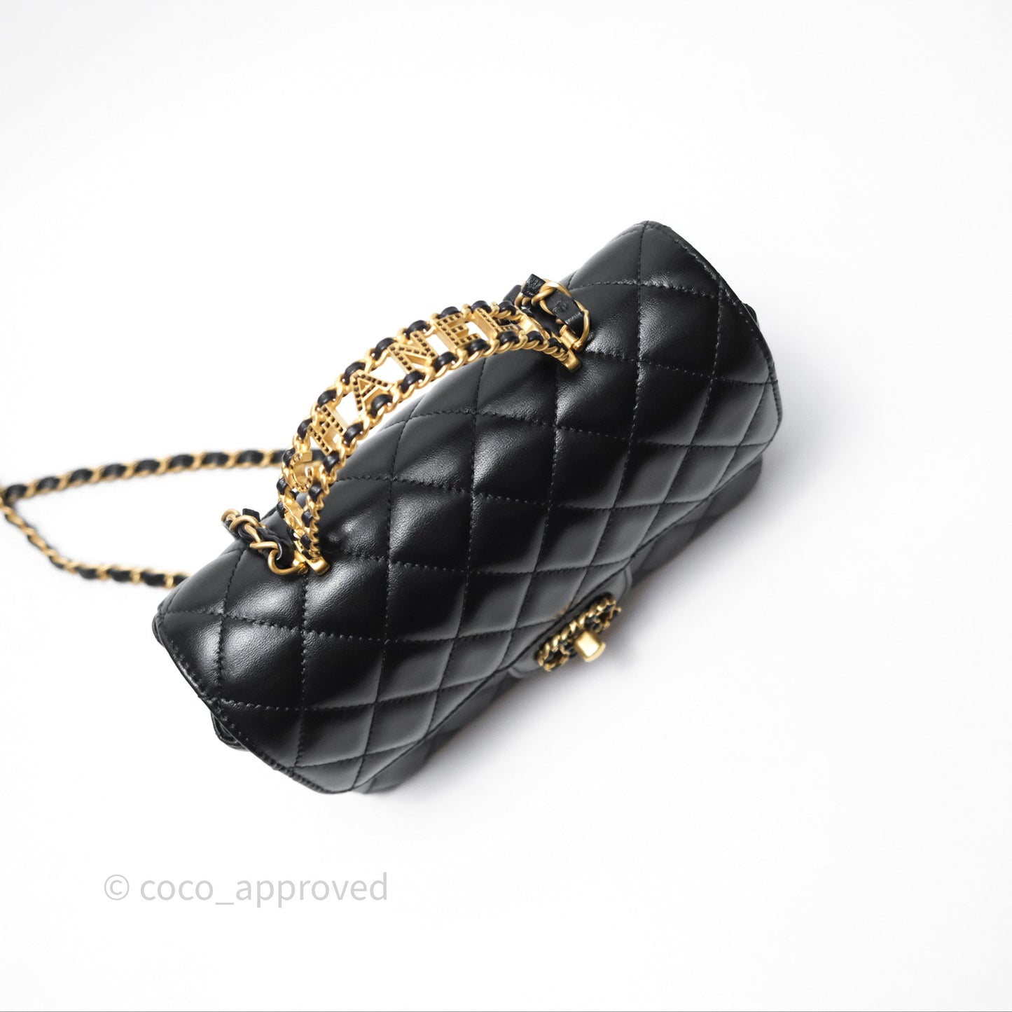 Chanel Flap Bag with Crystal Logo Top Handle Black Lambskin Aged Gold Hardware