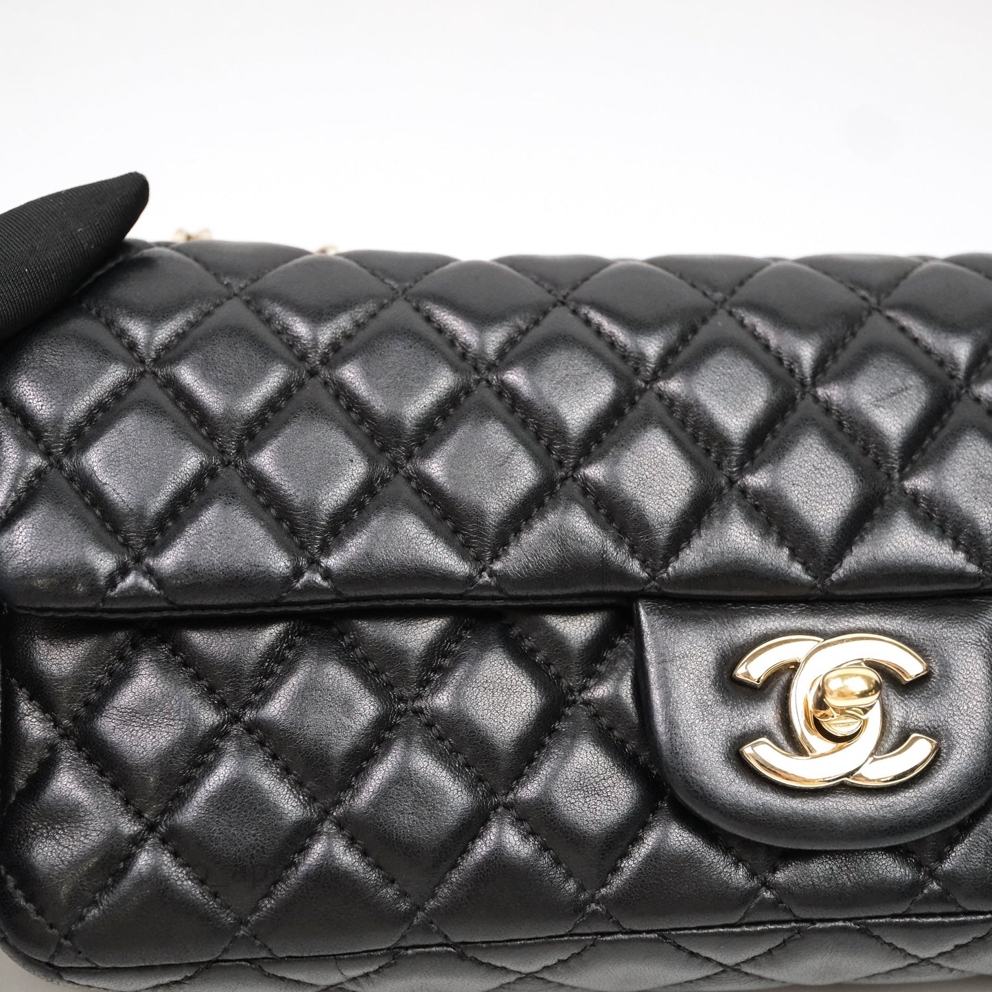 Chanel Quilted East West With Charm Flap Bag Lambskin Black Gold Hardware