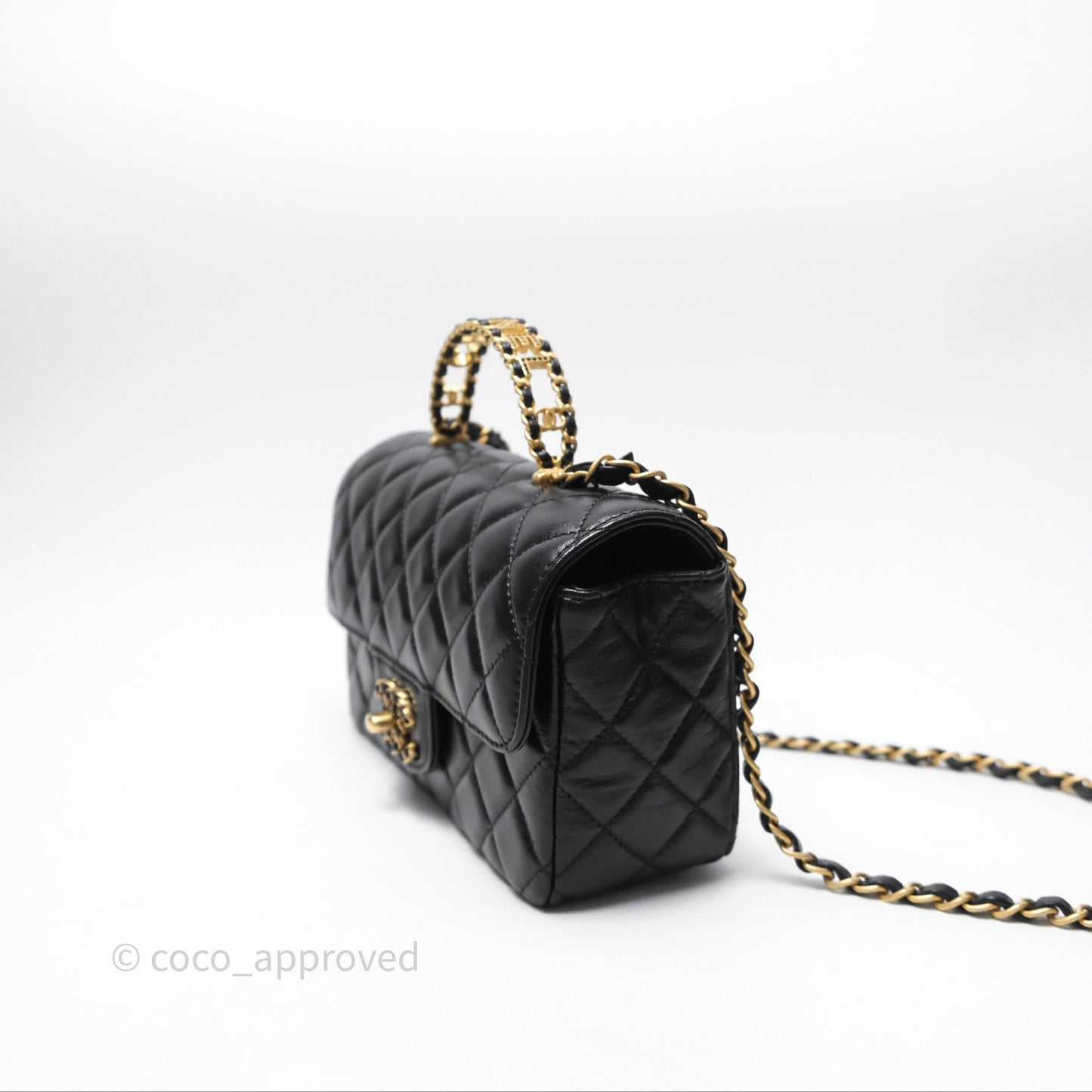 Chanel Flap Bag with Crystal Logo Top Handle Black Lambskin Aged Gold Hardware