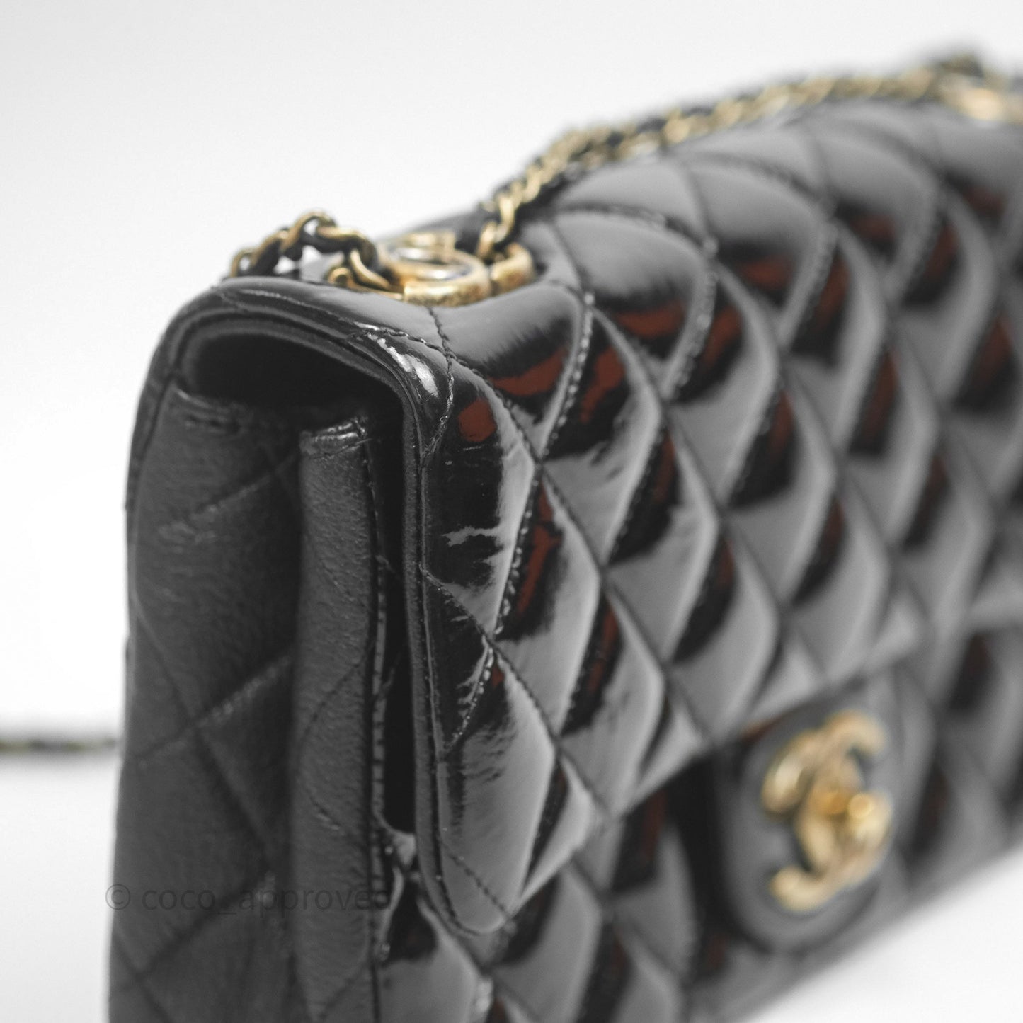 Chanel Quilted Medium Eyelet Flap Bag Black Patent Aged Gold Hardware