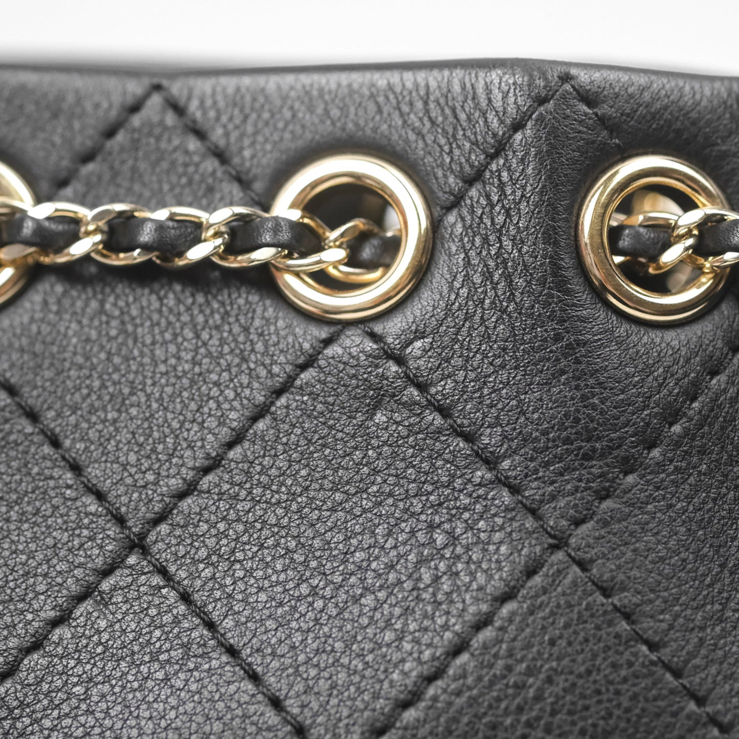 Chanel Quilted Drawstring Bucket Bag Black Calfskin Gold Hardware