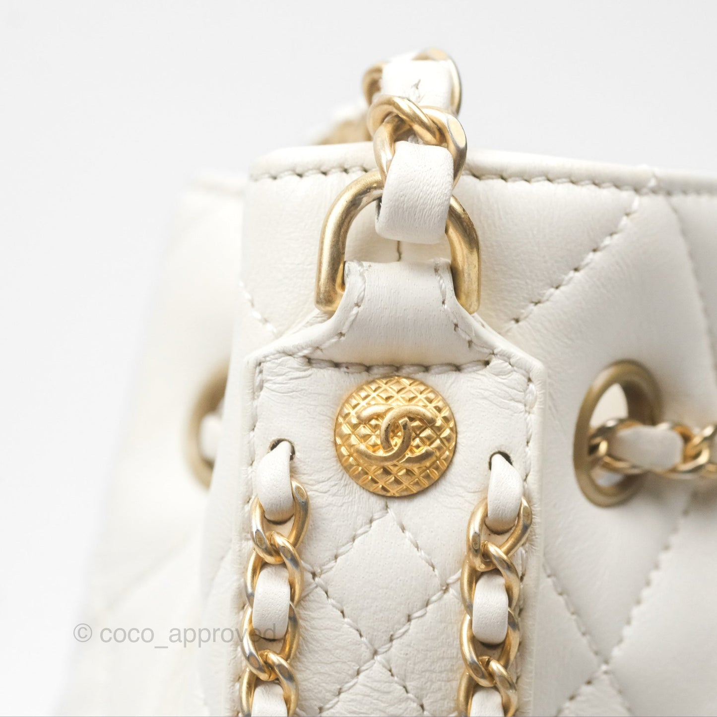 Chanel Quilted Drawstring Bucket Bag Ivory Lambskin Aged Gold Hardware