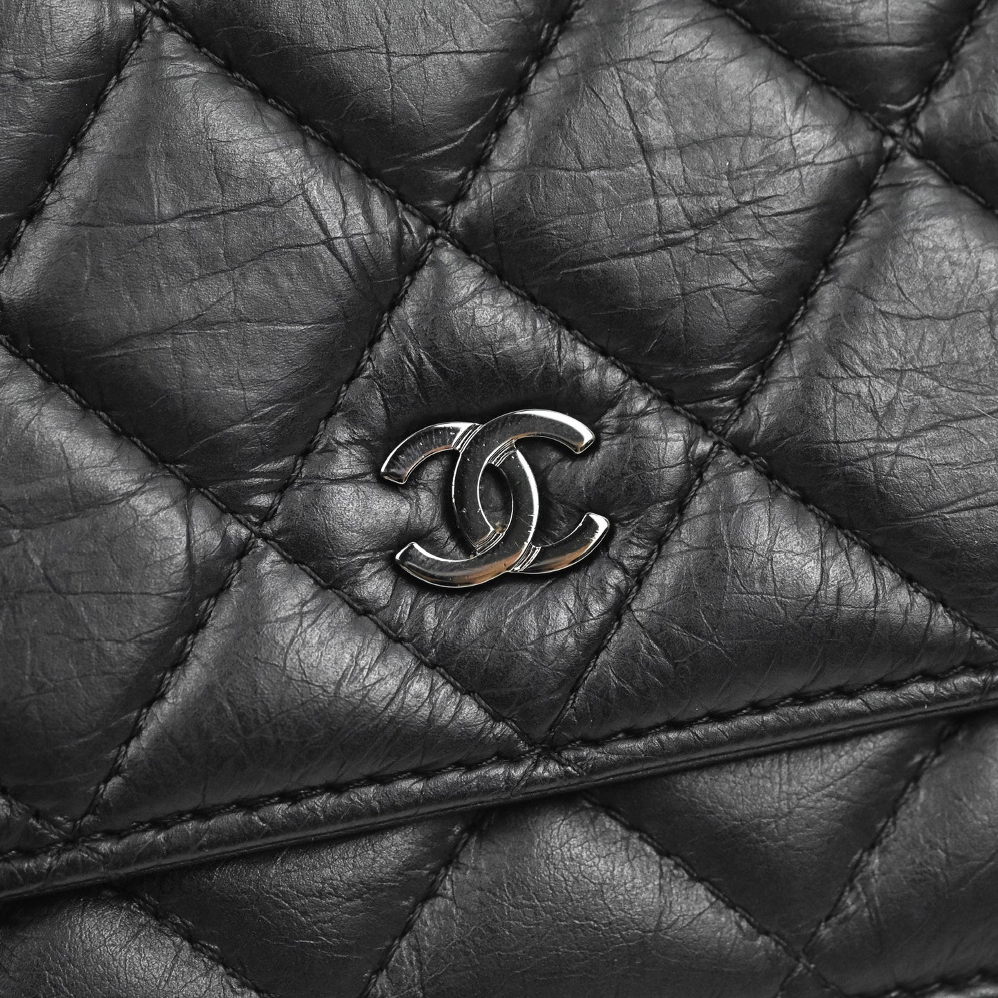 Chanel  Quilted Tassel Wallet On Chain WOC Black Aged Calfskin