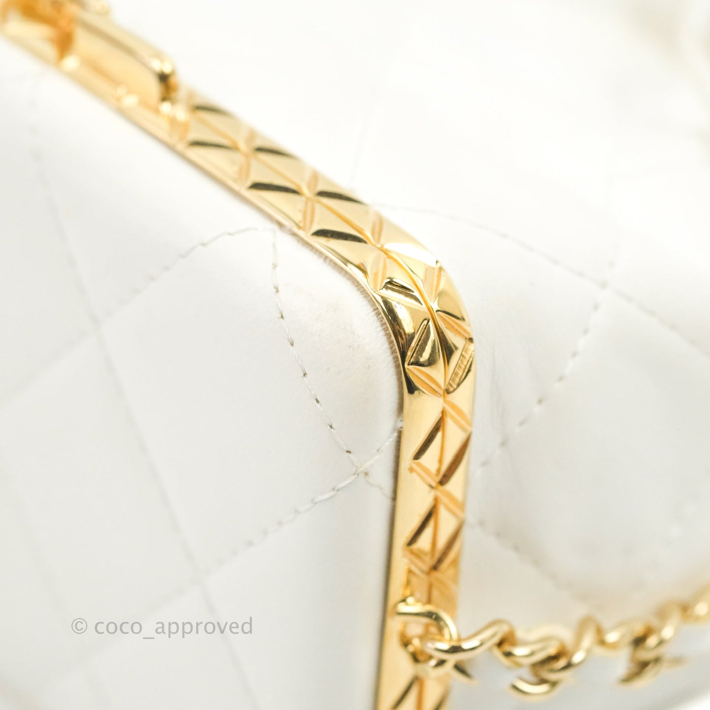 Chanel Quilted Small Drawstring Bucket Bag White Calfskin Gold Hardware
