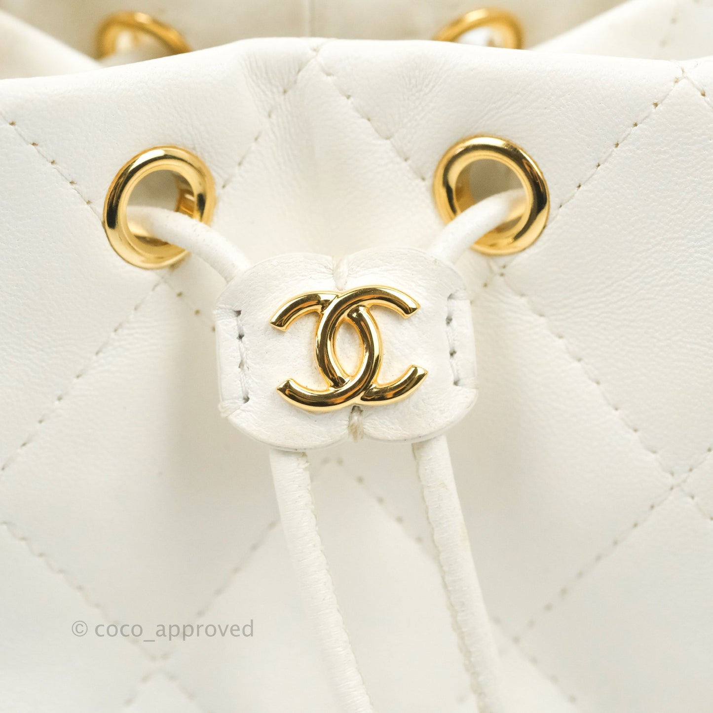 Chanel Quilted Small Drawstring Bucket Bag White Calfskin Gold Hardware