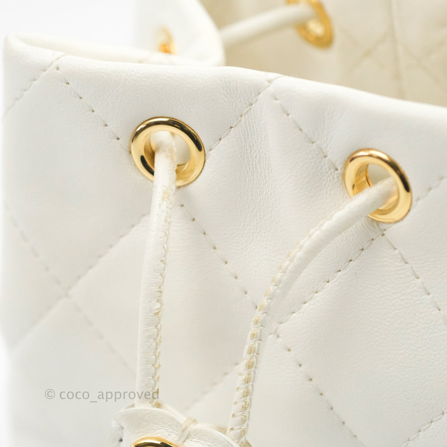 Chanel Quilted Small Drawstring Bucket Bag White Calfskin Gold Hardware