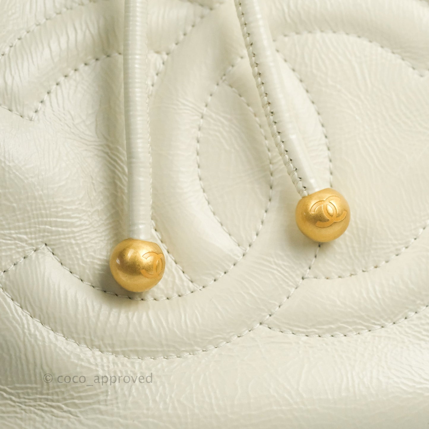 Chanel CC Small Drawstring Bucket Bag White Calfskin Aged Gold Hardware