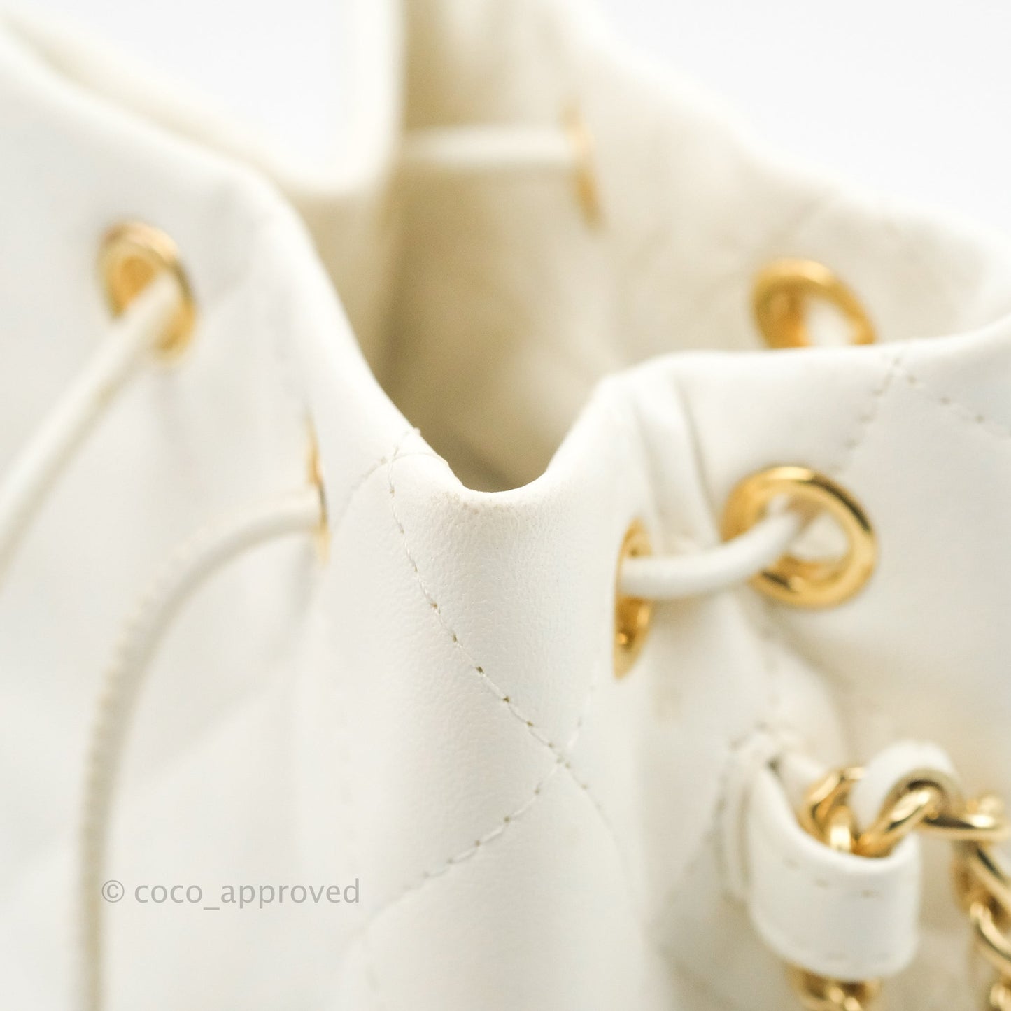 Chanel Quilted Small Drawstring Bucket Bag White Calfskin Gold Hardware
