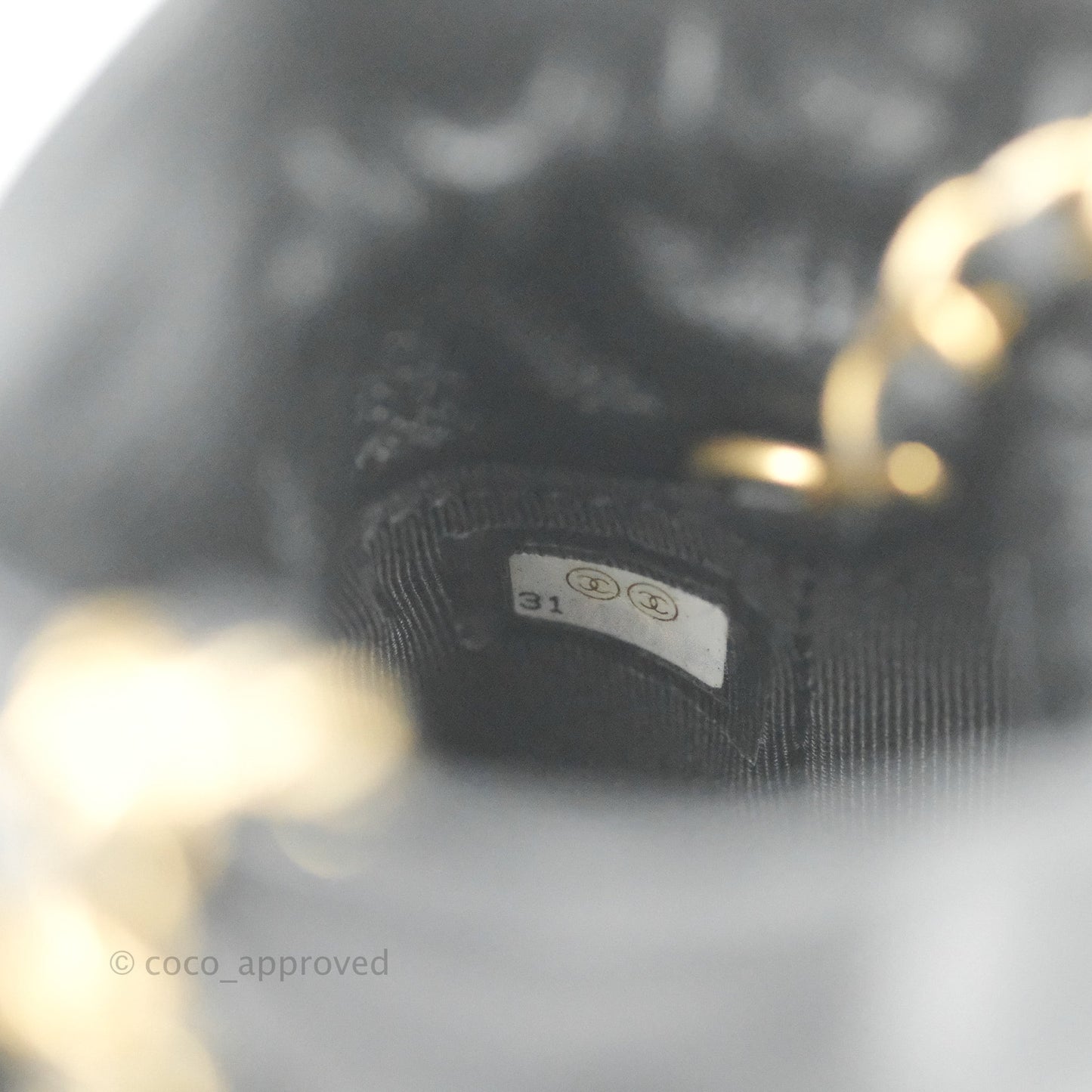 Chanel Mini Drawstring Bucket Bag with Chain Black Calfskin Aged Gold Hardware