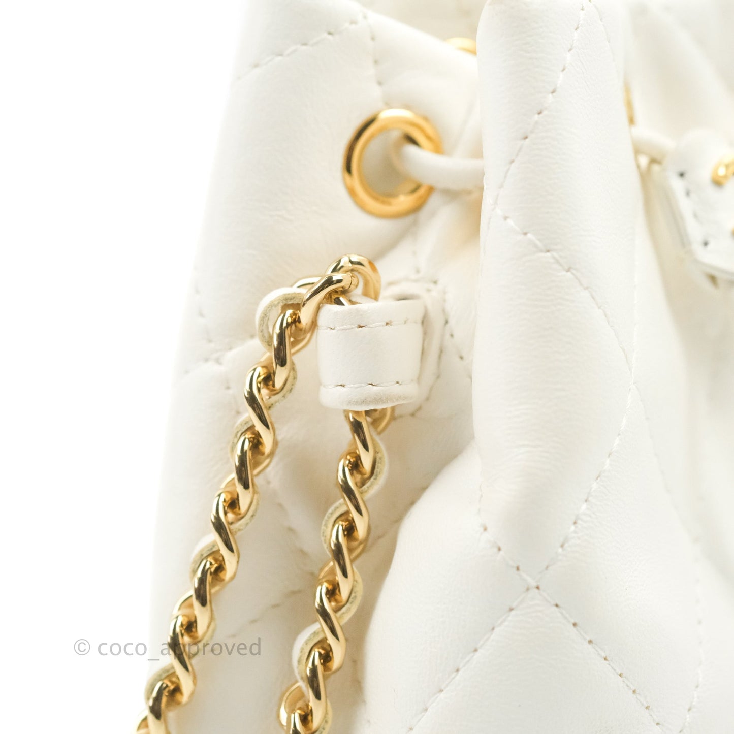 Chanel Quilted Small Drawstring Bucket Bag White Calfskin Gold Hardware