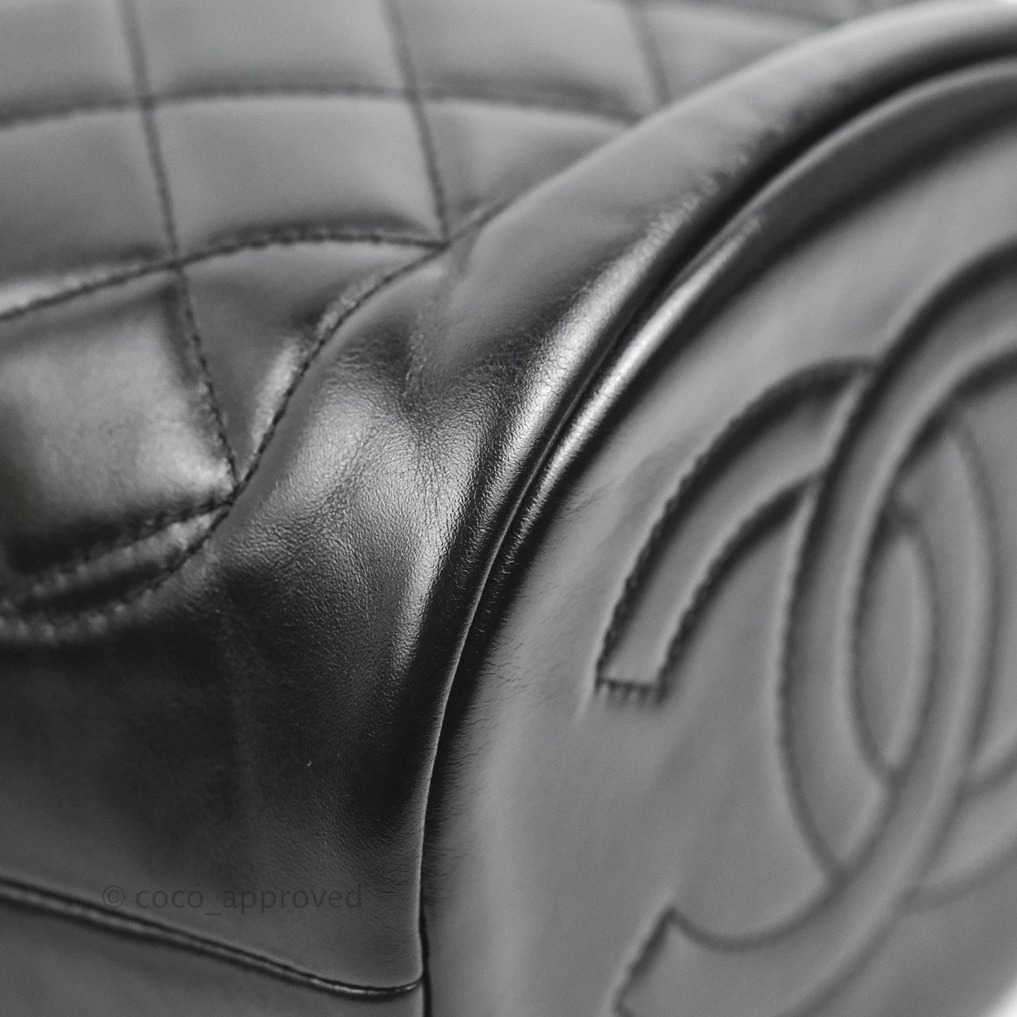 Chanel Quilted Drawstring Bucket Bag Black Calfskin Aged Gold Hardware