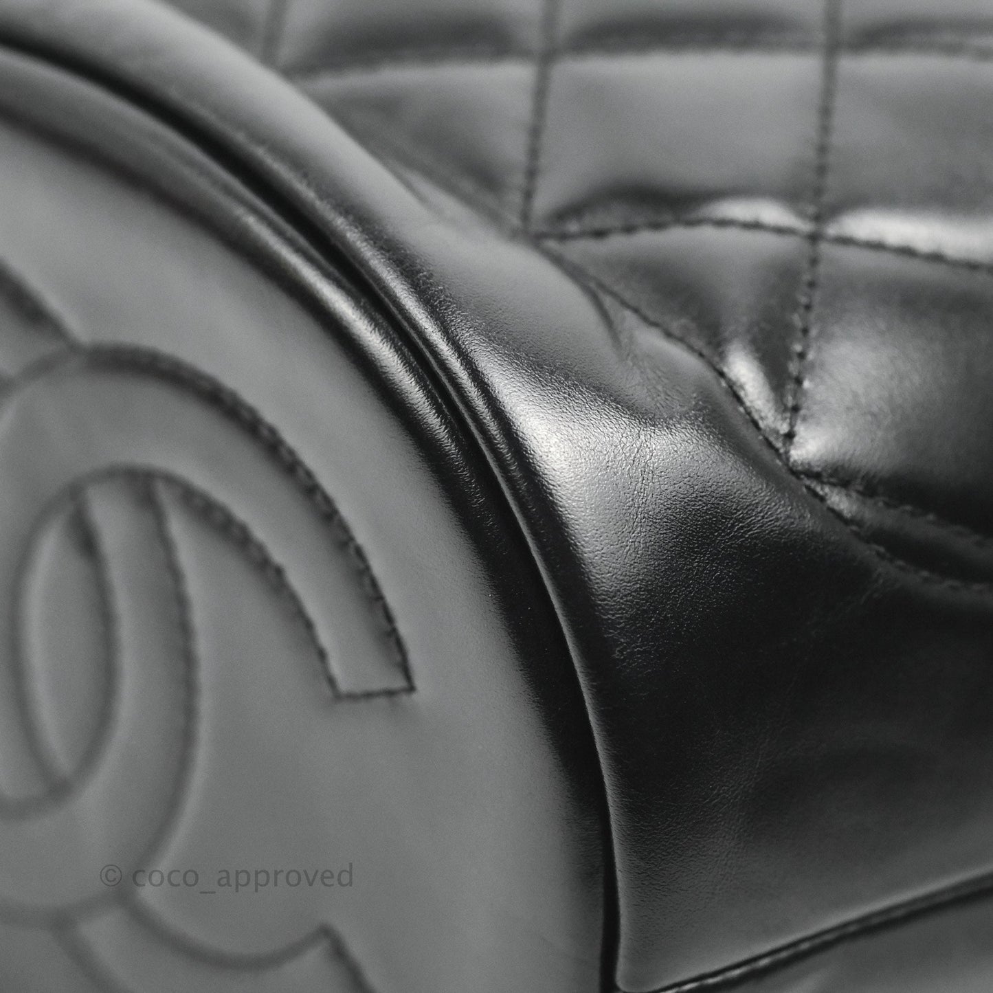 Chanel Quilted Drawstring Bucket Bag Black Calfskin Aged Gold Hardware