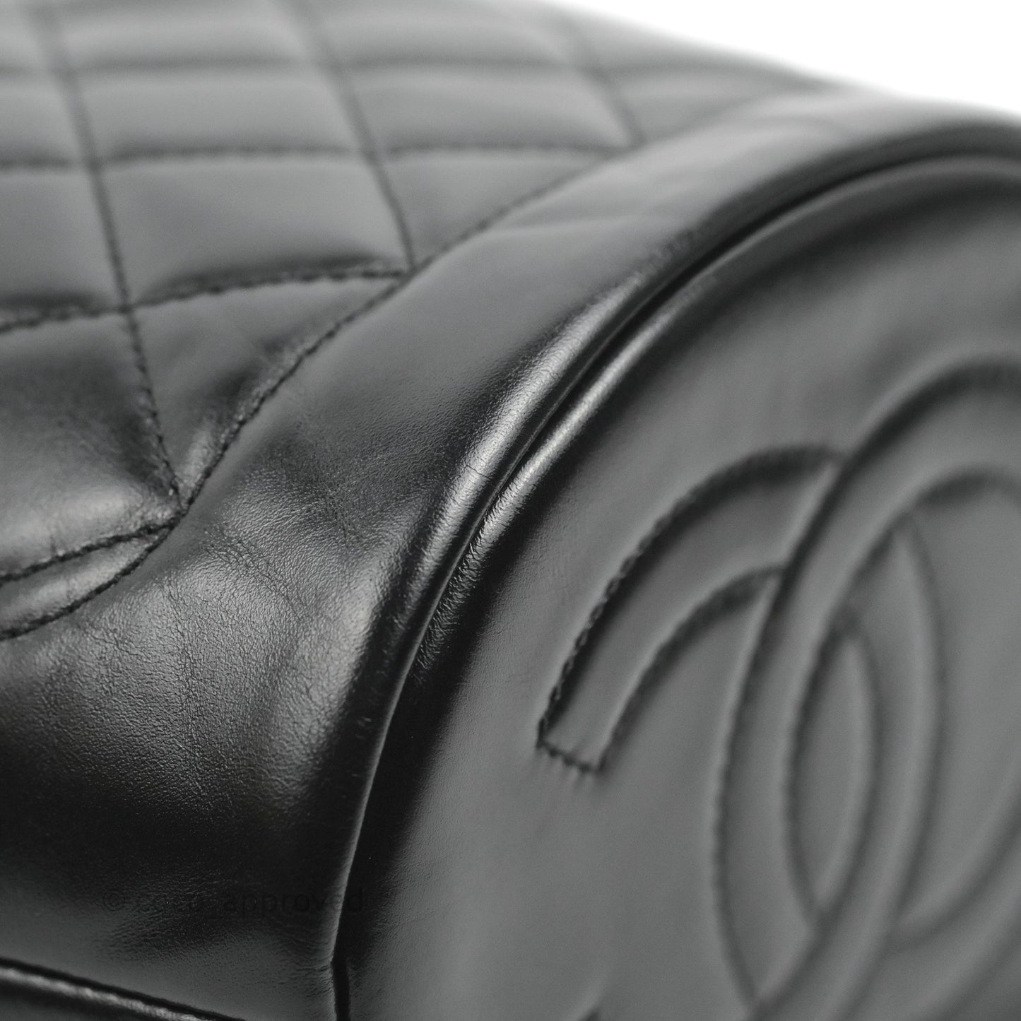 Chanel Quilted Drawstring Bucket Bag Black Calfskin Aged Gold Hardware