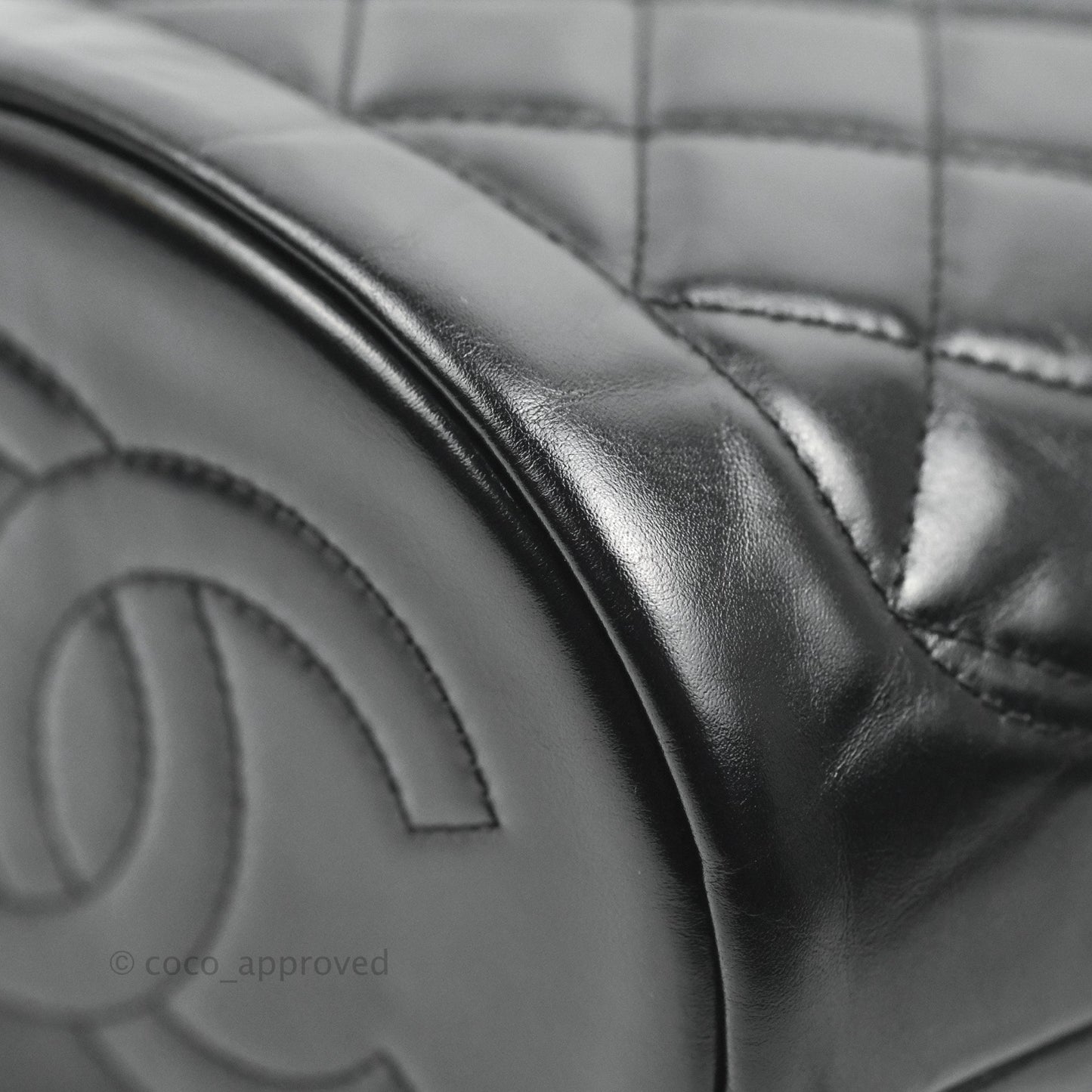 Chanel Quilted Drawstring Bucket Bag Black Calfskin Aged Gold Hardware