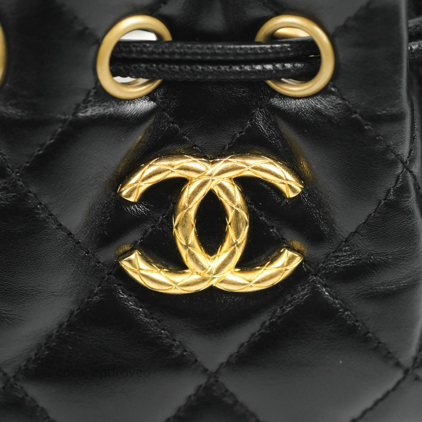 Chanel Quilted Drawstring Bucket Bag Black Calfskin Aged Gold Hardware