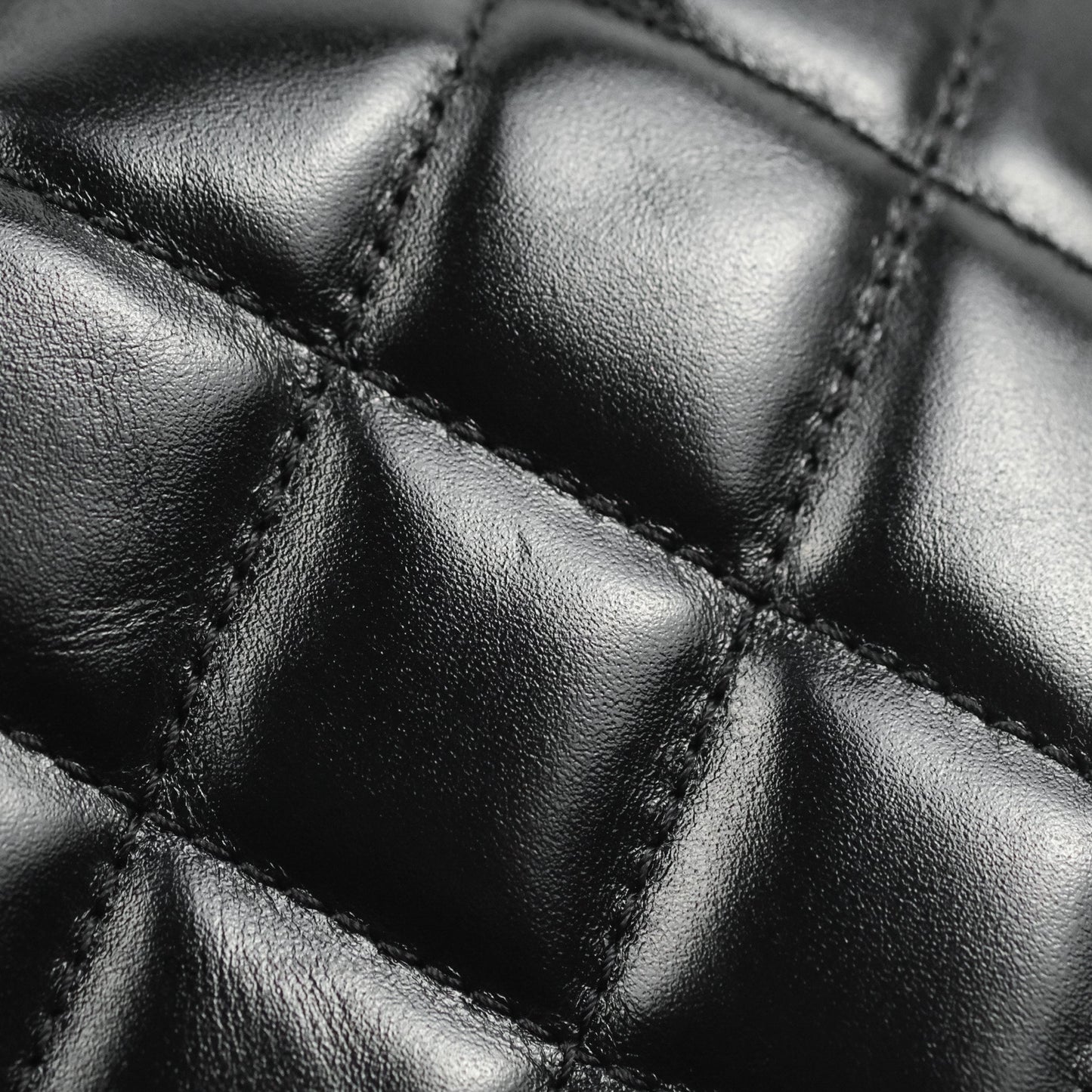 Chanel Quilted Drawstring Bucket Bag Black Calfskin Aged Gold Hardware