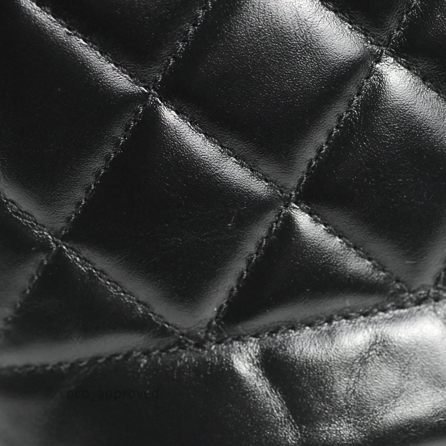 Chanel Quilted Drawstring Bucket Bag Black Calfskin Aged Gold Hardware