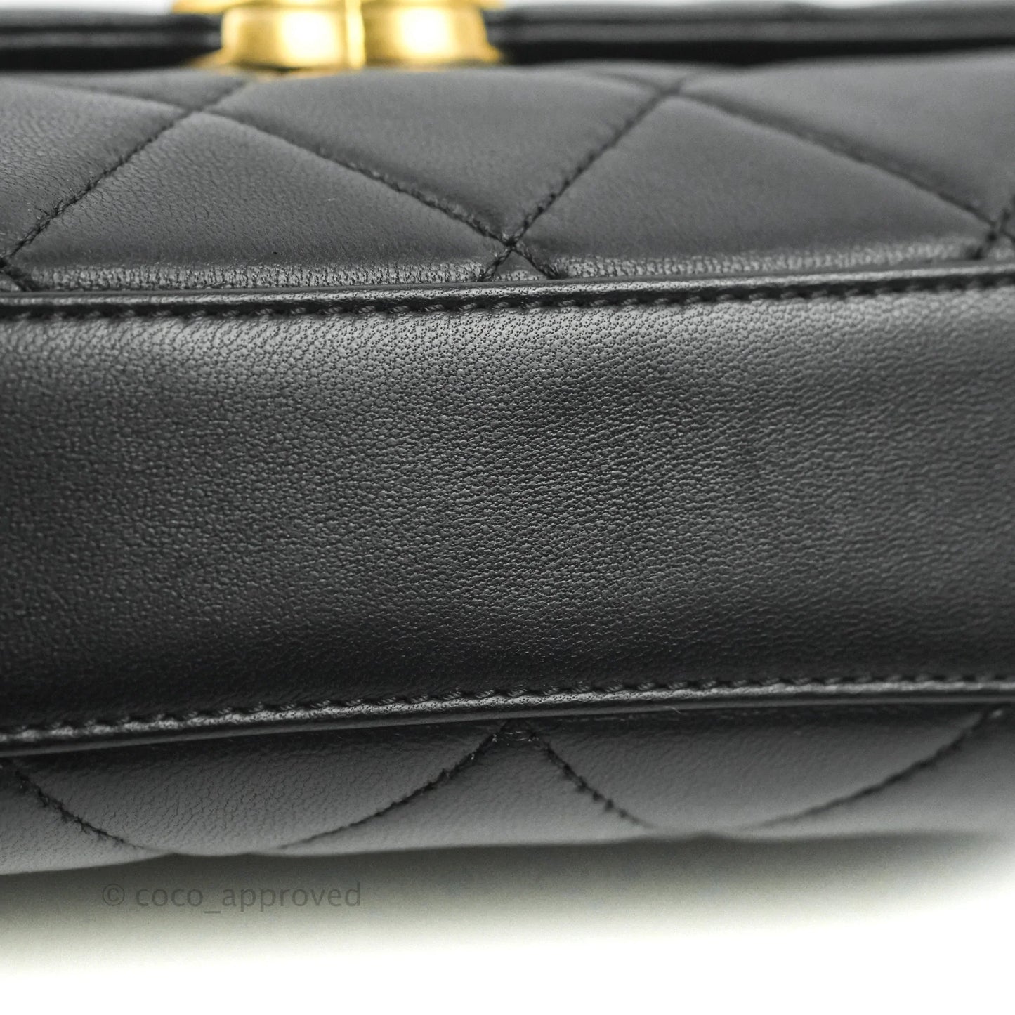 Chanel Quilted Small Flap Bag with CC Crystal Logo Handle Black Lambskin Aged Gold Hardware