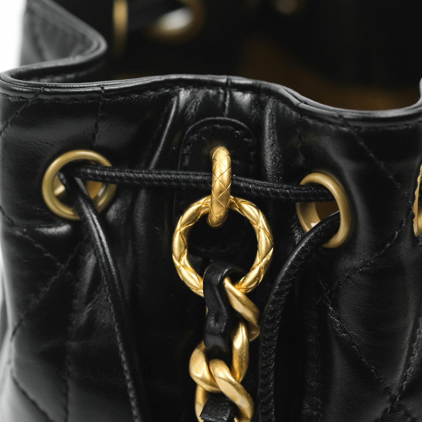 Chanel Quilted Drawstring Bucket Bag Black Calfskin Aged Gold Hardware