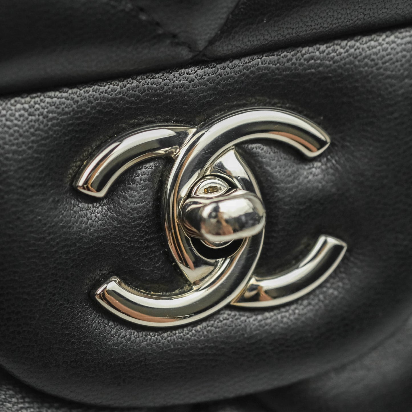 Chanel Quilted Maxi Single Flap Black Lambskin Silver Hardware