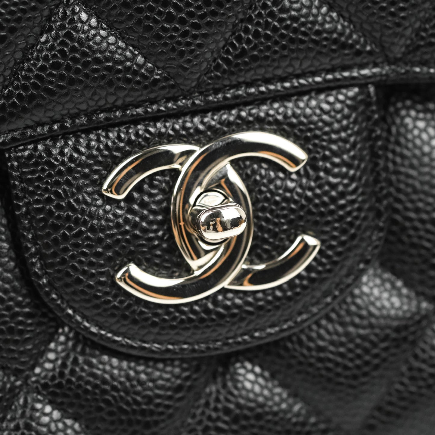 Chanel Quilted Maxi Double Flap Black Caviar Silver Hardware