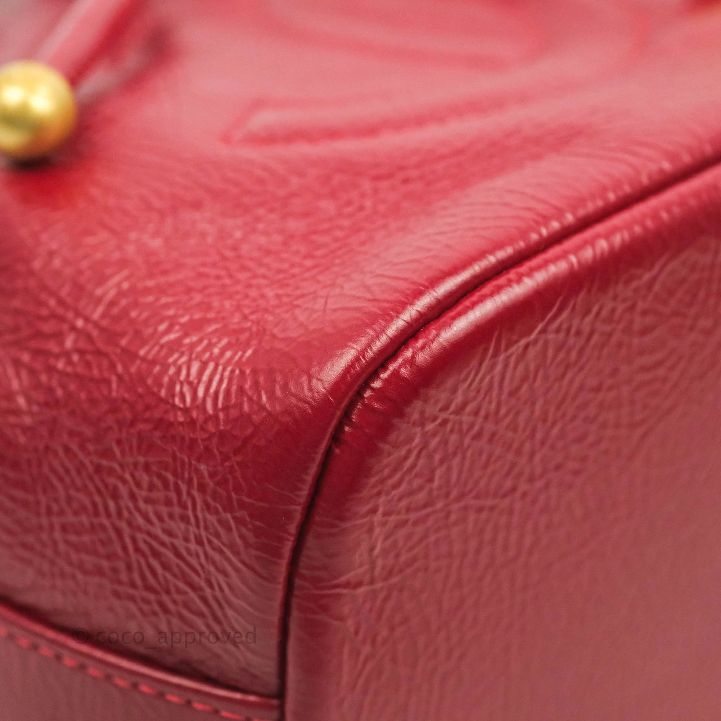 Chanel Shiny Aged Calfskin CC Chain Mini Drawstring Bag Red