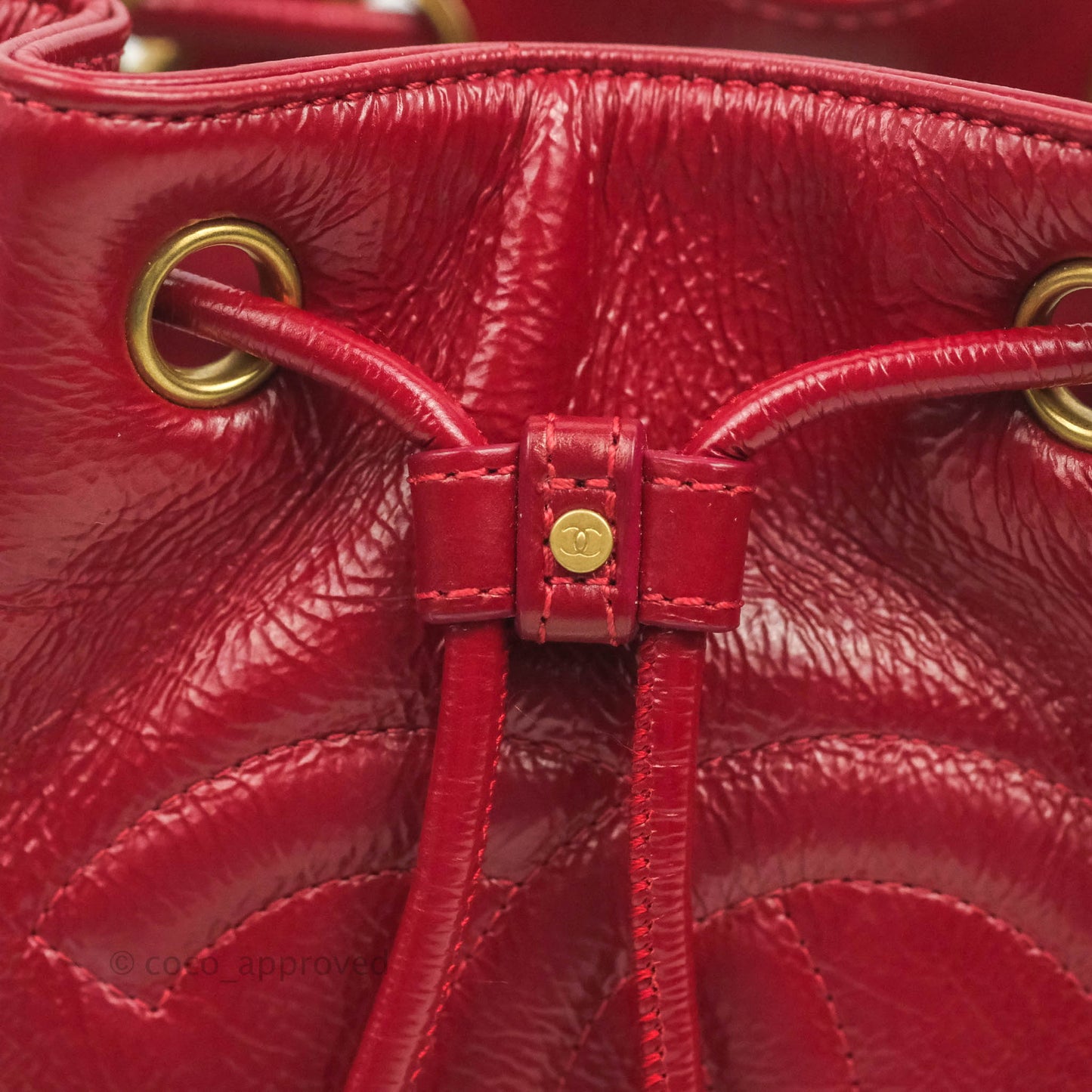 Chanel Shiny Aged Calfskin CC Chain Mini Drawstring Bag Red