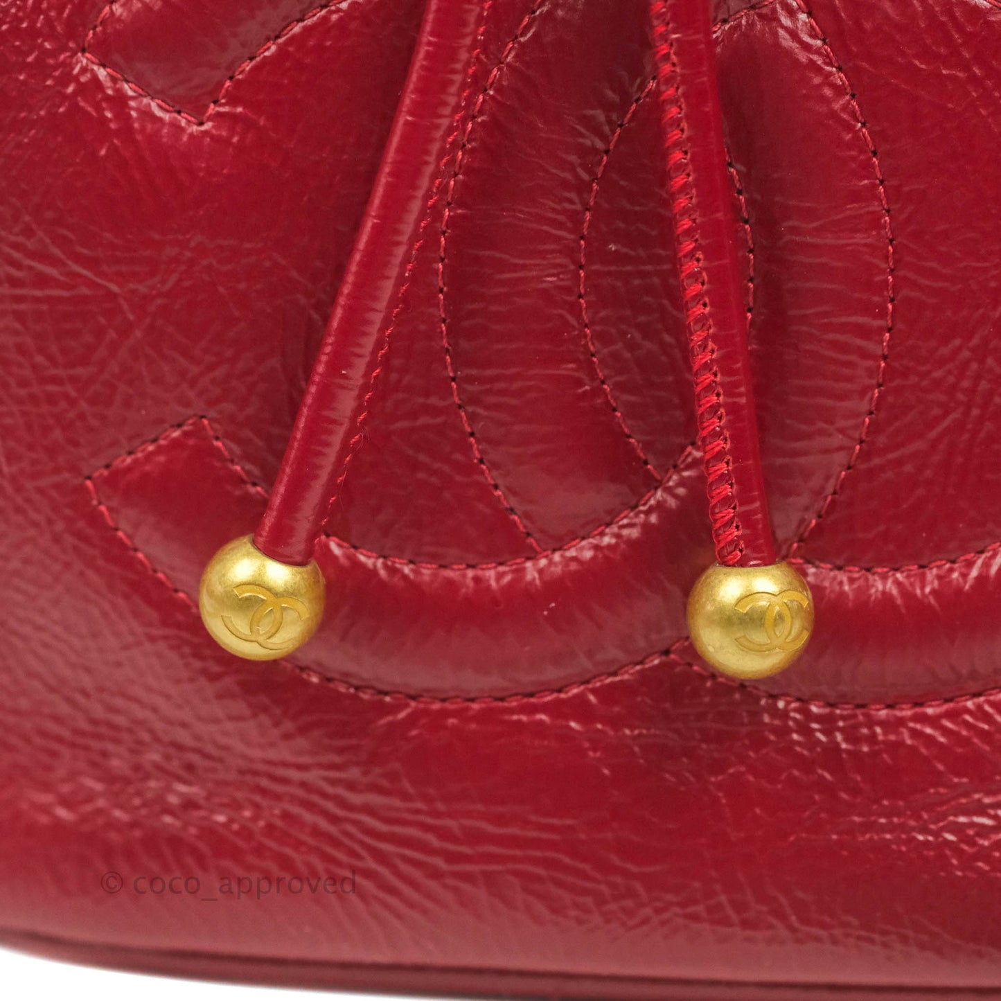 Chanel Shiny Aged Calfskin CC Chain Mini Drawstring Bag Red