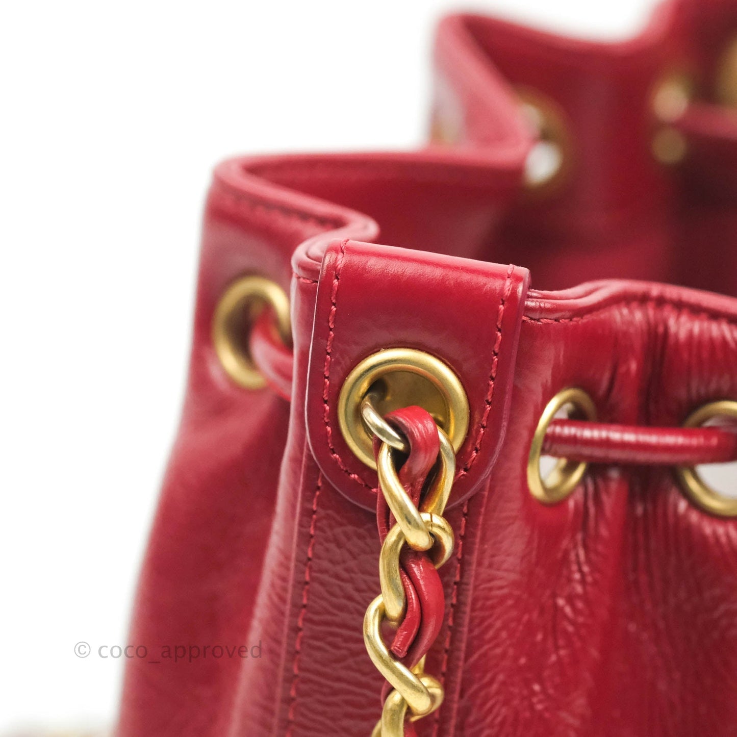 Chanel Shiny Aged Calfskin CC Chain Mini Drawstring Bag Red